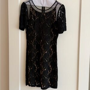 Astr black lace mini dress. Nude lining. 
Great for the holidays